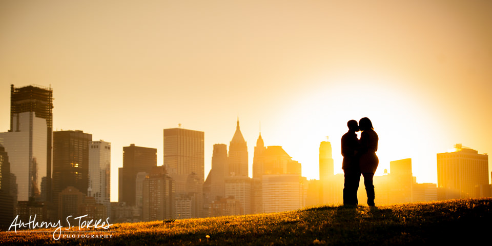 Engagement portrait silhouette with New York skyline, Jersey City NJ